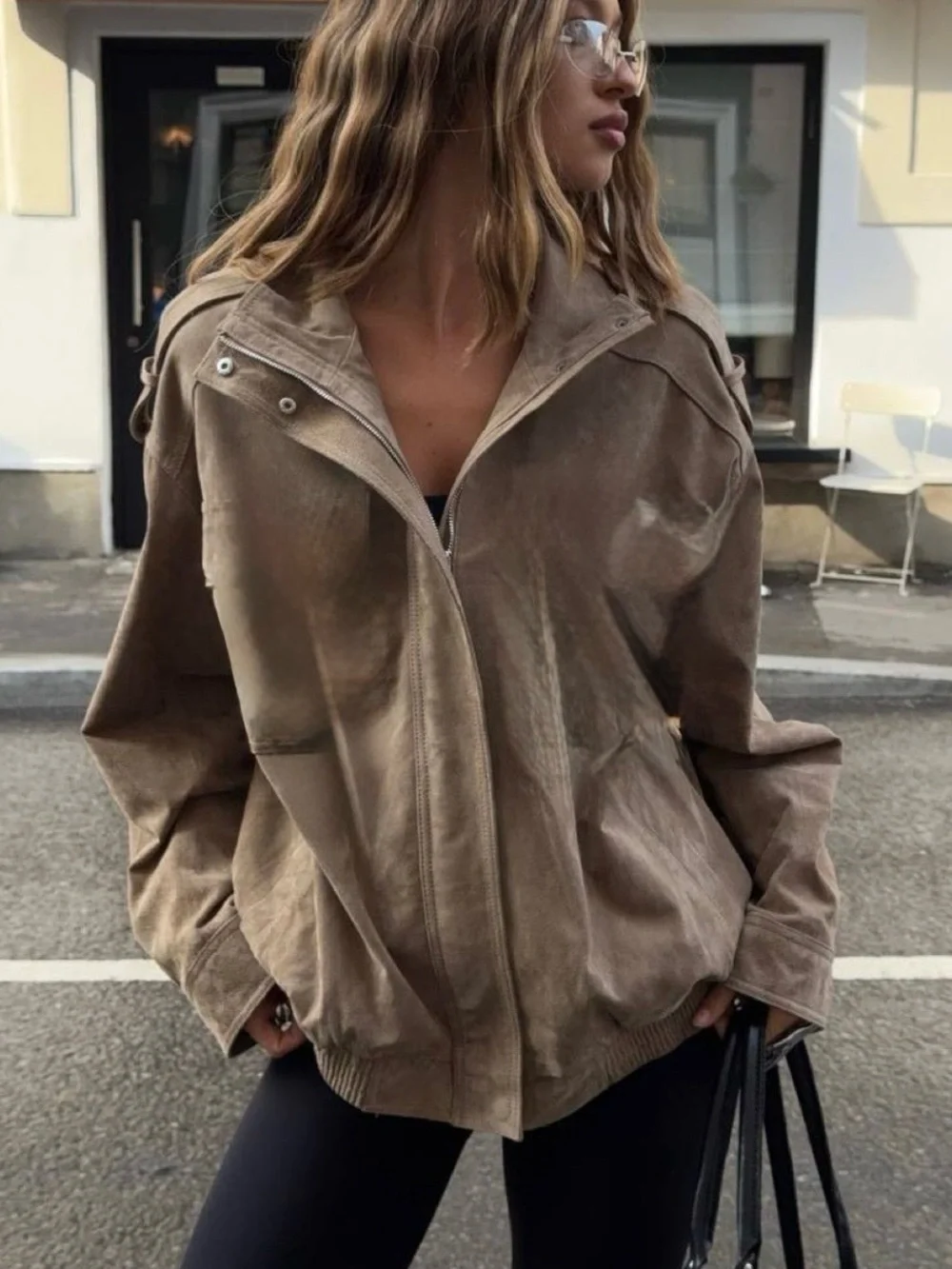 Tan leather bomber jacket